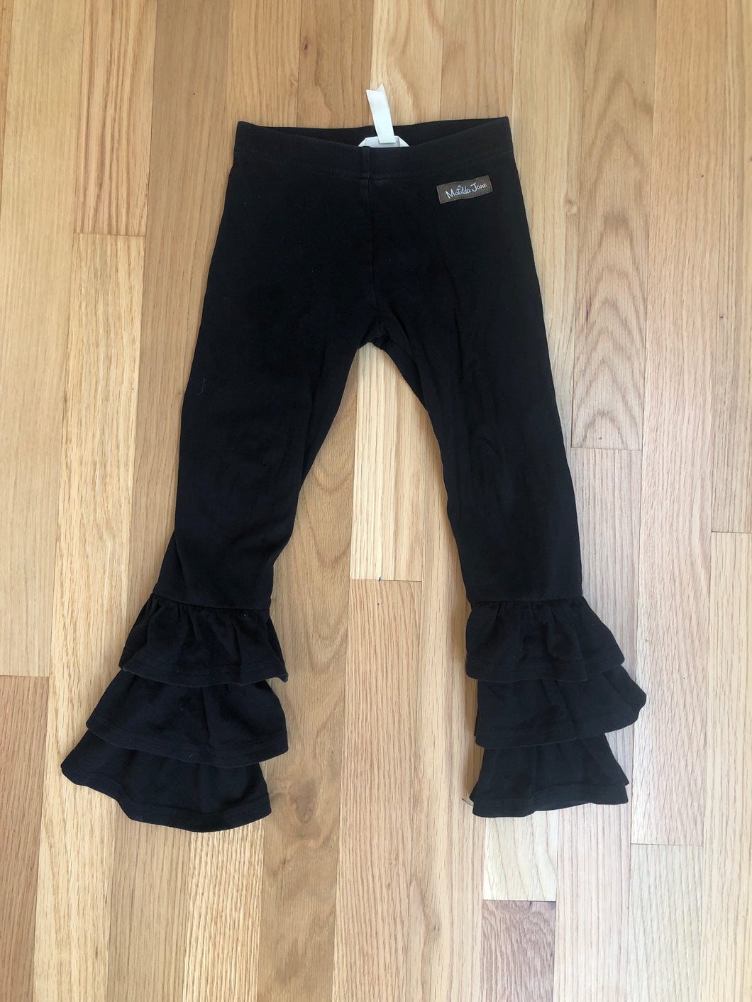 Matilda Jane girls ruffle pants size 4- good condition. Has one small hole on the right knee 4