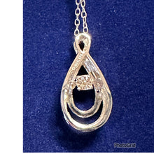 Load image into Gallery viewer, Silver diamond teardrop necklace, new with box.  Small diamond chip &quot;floats&quot; with movement and heartbeat.
