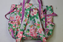 Load image into Gallery viewer, Matilda Jane Clothing floral diaper bag - has so many compartments and pockets plus attachment for hanging on your stroller.  Can be worn as a backpcak, shoulder bag or carrying handles.  Does not come with a changing pad.  One Size
