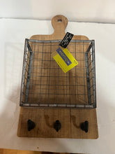 Load image into Gallery viewer, Wall hanging cutting board with hooks and basket.
