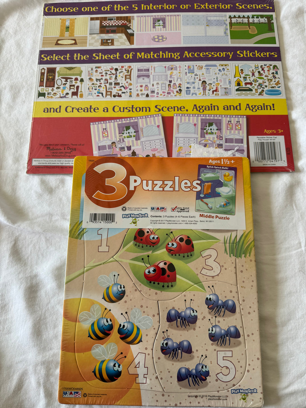 Three 5 Piece Puzzles Bug Numbers, Bath Time and Farm Animals for Age 1 and 1/2. New in Package. Melissa and Doug Reusable Sticker Pad Play House also New in Package for Age 3 Plus.