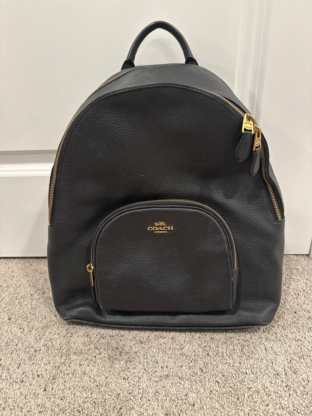 Coach black leather backpack