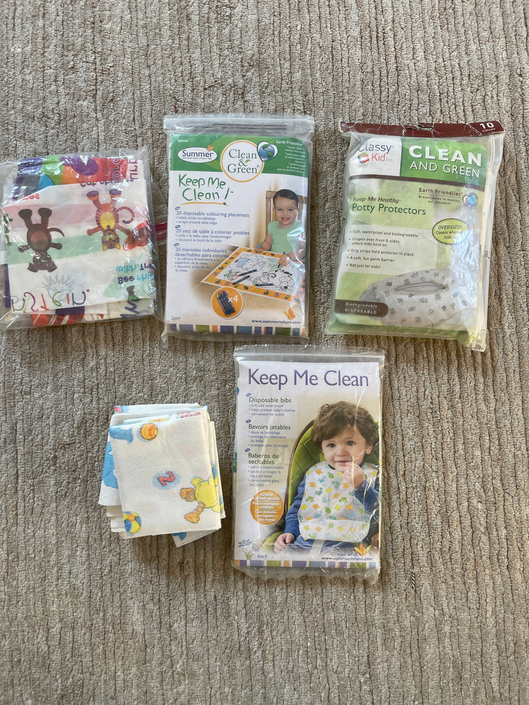 Summer Keep Me Clean disposable bibs, placemats, potty cover and changing pad